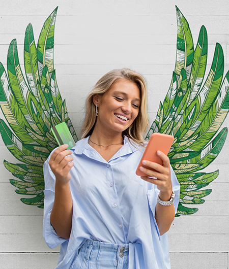 a woman excitedly checks her free checking account with mobile banking