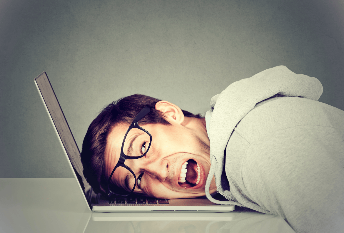 Man feeling frustrated after he fell for a common scam and compromised his financial security.