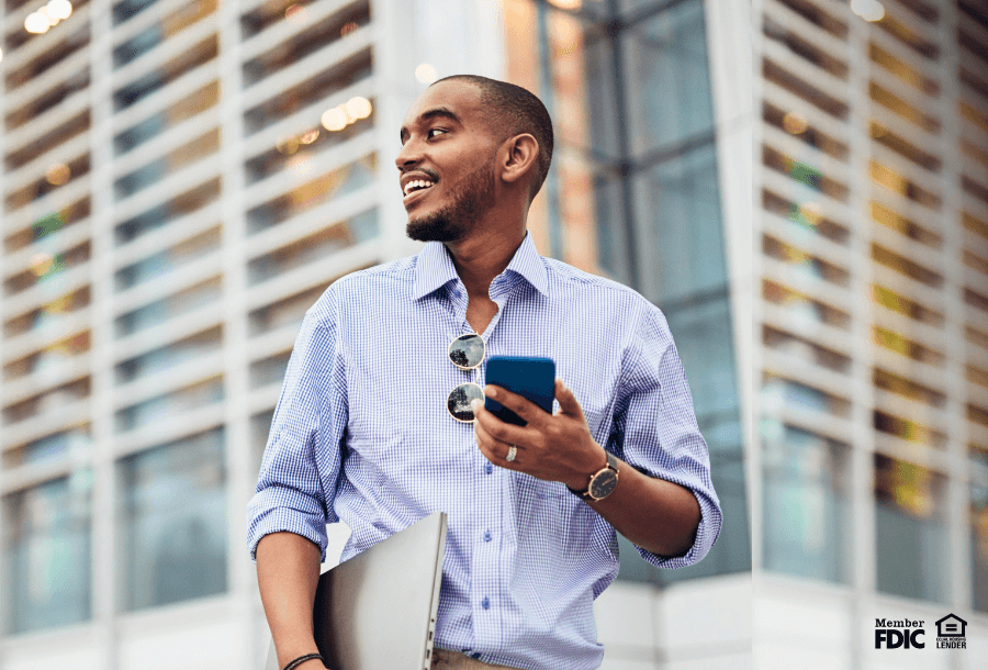 Commercial Business man speaks with his bank about real estate loan.