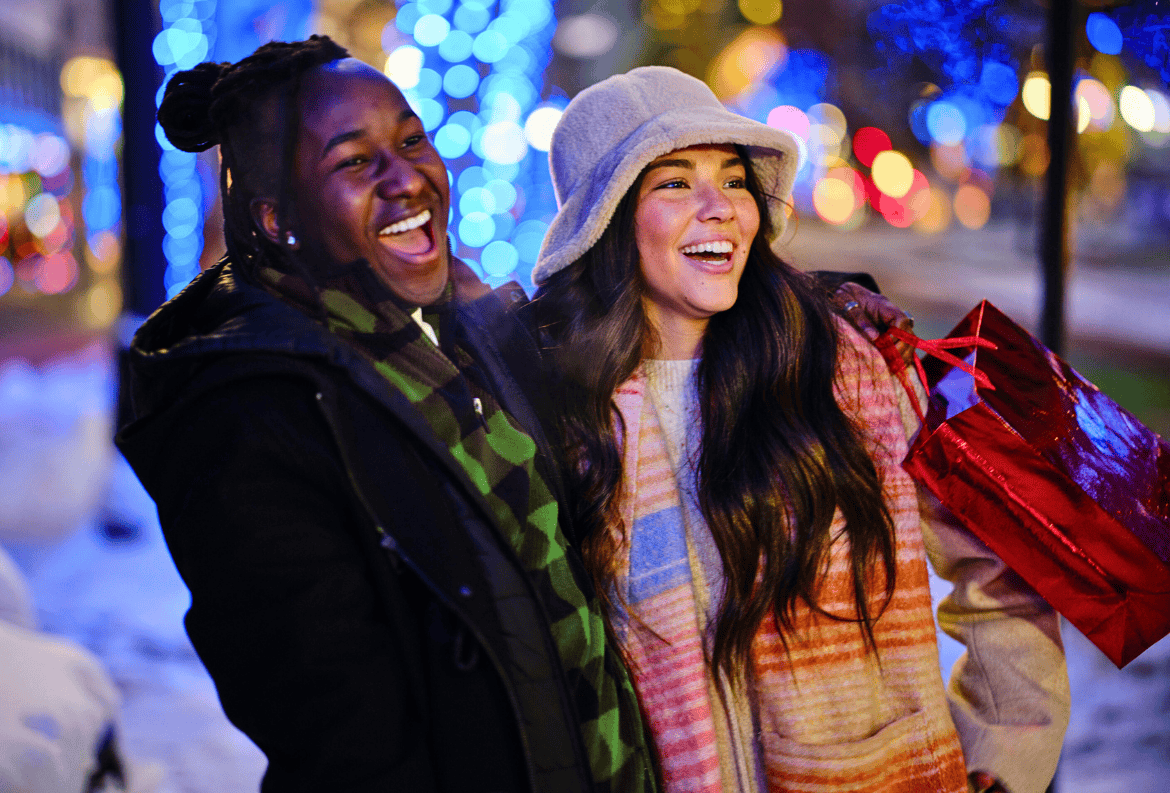 Friends shopping for the holidays with the help of rewards checking accounts.